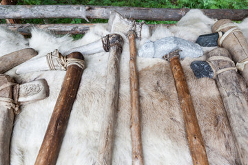 Different kind of stone age axes in a row
