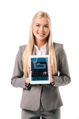 attractive blonde businesswoman showing digital tablet with booking app, isolated on white