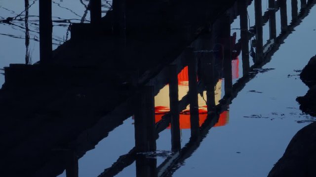 Eckernf&ouml;rde Pier  Lighthouse mirroring in the water
