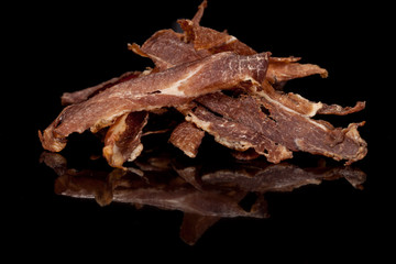  tasty, crispy, meat, smoked, crisp snack on a black background, for culinary design