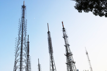 Telecommunication towers, masts and blue sky 