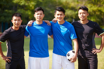 outdoor portrait of asian soccer players