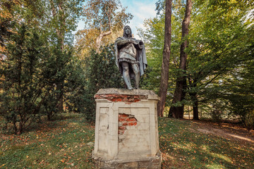 Obraz premium Lancut castle. Statue in Park surrounding the castle