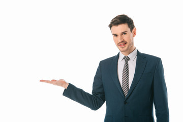 successful businessman presenting something isolated on white