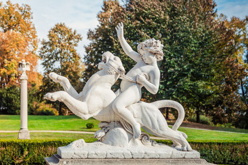 Lancut castle. Italian garden. The statue of Bacchus on the panther