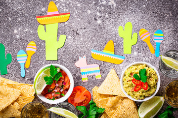 Guacamole, salsa, nachos and tequila