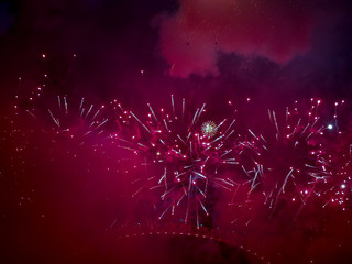 The London New year fireworks display captured from the central Barge on the River Thames