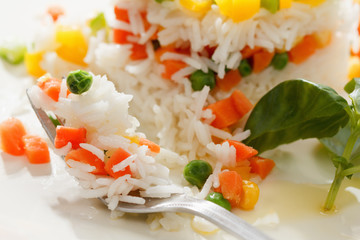Vegetarian food, rice salad with vegetables, healthy meals