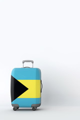 Travel suitcase with the flag of Bahamas. Holiday destination. 3D Render