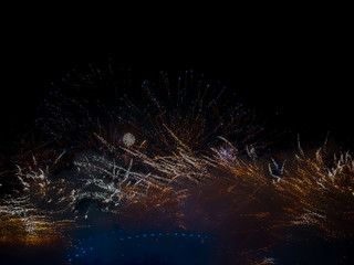 The London New year fireworks display captured from the central Barge on the River Thames