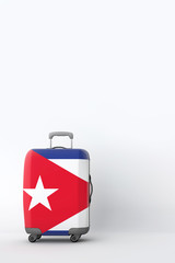 Travel suitcase with the flag of Cuba. Holiday destination. 3D Render