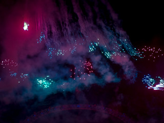 The London New year fireworks display captured from the central Barge on the River Thames