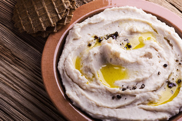 White beans hummus  with rye waffles, healthy snack dip