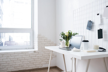 Stylish white professional office interior, minimalist loft workspace