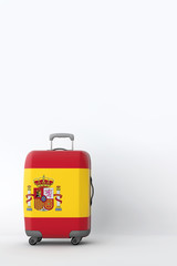 Travel suitcase with the flag of Spain. Holiday destination. 3D Render