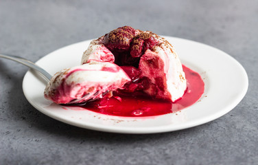 Cottage cheese dessert (jelly or panna cotta) with cherry sauce and cocoa. Healthy breakfast or dessert.  