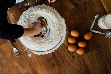 Chef making fresh pasta in the kitchen