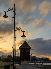 Obraz premium old street lamp on the background of blue sky in Nessebar