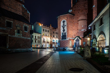 Fototapeta na wymiar Mary's Basilica (Church of Our Lady Assumed into Heaven) in Krakow, Poland at night