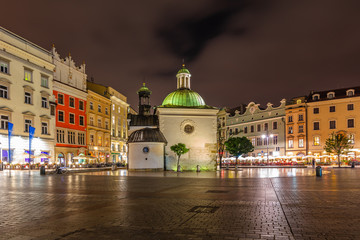 Naklejka premium Church of St. Adalbert or Church of St. Wojciech at night in Krakow, Poland