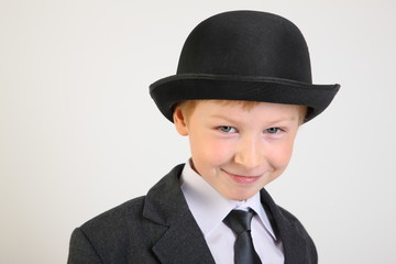 hat, boy, smile, school clothes, portrait, boy, child, schoolboy with a phone, artist, actor, boy actor, young model, portrait boy, school suit, school uniform, tie, conversation, blond, posing
