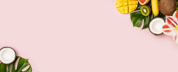Creative flat lay with tropical fruits and plants