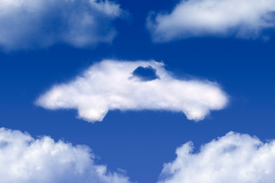 Car shaped cloud on blue sky