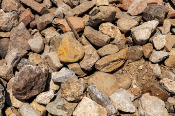 Heap of ancient building stones, pile of ancient building stones.