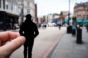 silhouette of a man on the street in London, UK