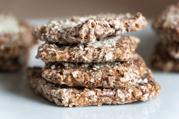 Vegan cookies from wheat and raisins on plate. Front view.