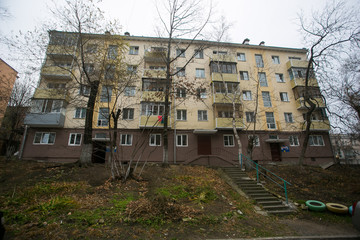 Fototapeta premium Residential development of Vladivostok panel and brick houses. Streets of sleeping areas of the capital of the Far East