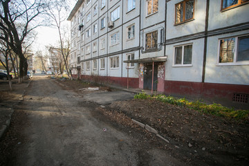 Obraz premium Residential development of Vladivostok panel and brick houses. Streets of sleeping areas of the capital of the Far East