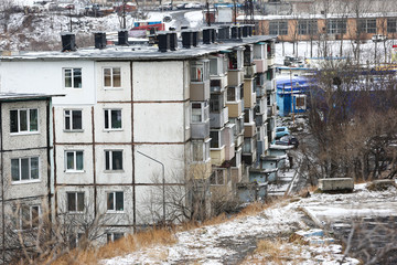 Fototapeta premium Residential development of Vladivostok panel and brick houses. Streets of sleeping areas of the capital of the Far East