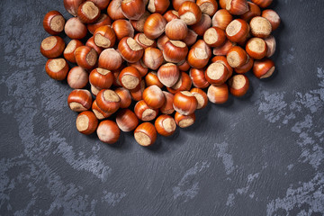 Hazelnut   on black table ,with copy space ,Top view