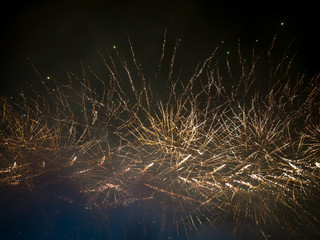 The London New year fireworks display captured from the central Barge on the River Thames