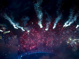 The London New year fireworks display captured from the central Barge on the River Thames