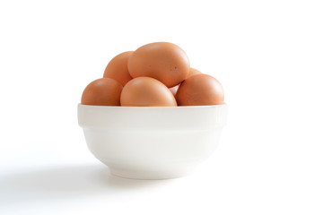 The white bowl with eggs inside
