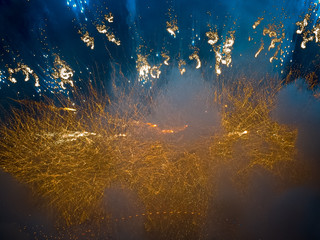 The London New year fireworks display captured from the central Barge on the River Thames