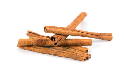 Fragrant cinnamon sticks isolated on white background