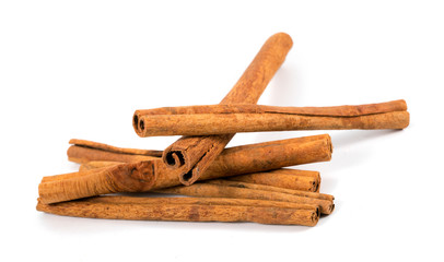 Fragrant cinnamon sticks isolated on white background