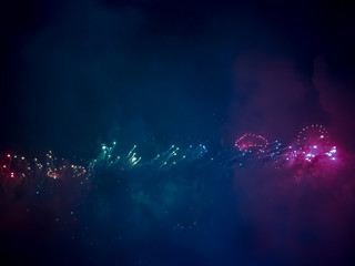 The London New year fireworks display captured from the central Barge on the River Thames