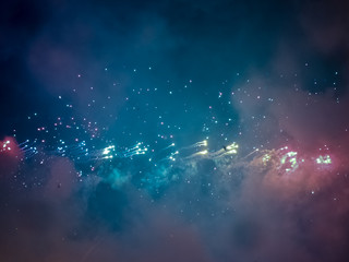 The London New year fireworks display captured from the central Barge on the River Thames