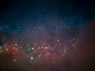 The London New year fireworks display captured from the central Barge on the River Thames
