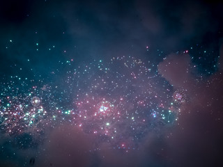 The London New year fireworks display captured from the central Barge on the River Thames