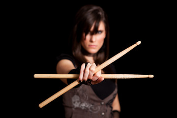Young Rocker Woman Holding Drumsticks - Rock Drummer Musician