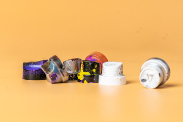 several used spray caps or dispensers b