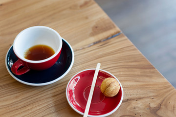 Coffee cup close up morning cafe view. Coffee concept. Wooden texture background. Wood material. Roasted Italian espresso. Place for text. Natural vintage shop with coffee and cappuccino