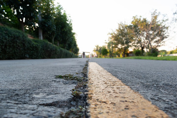 yellow line marking on old cement road