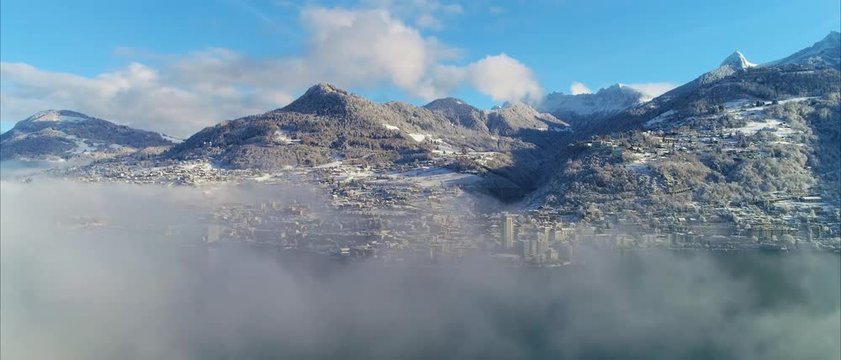 Fast flight over montreux in winter cinemascope