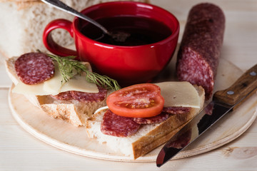 Sandwiches with salami and cheese